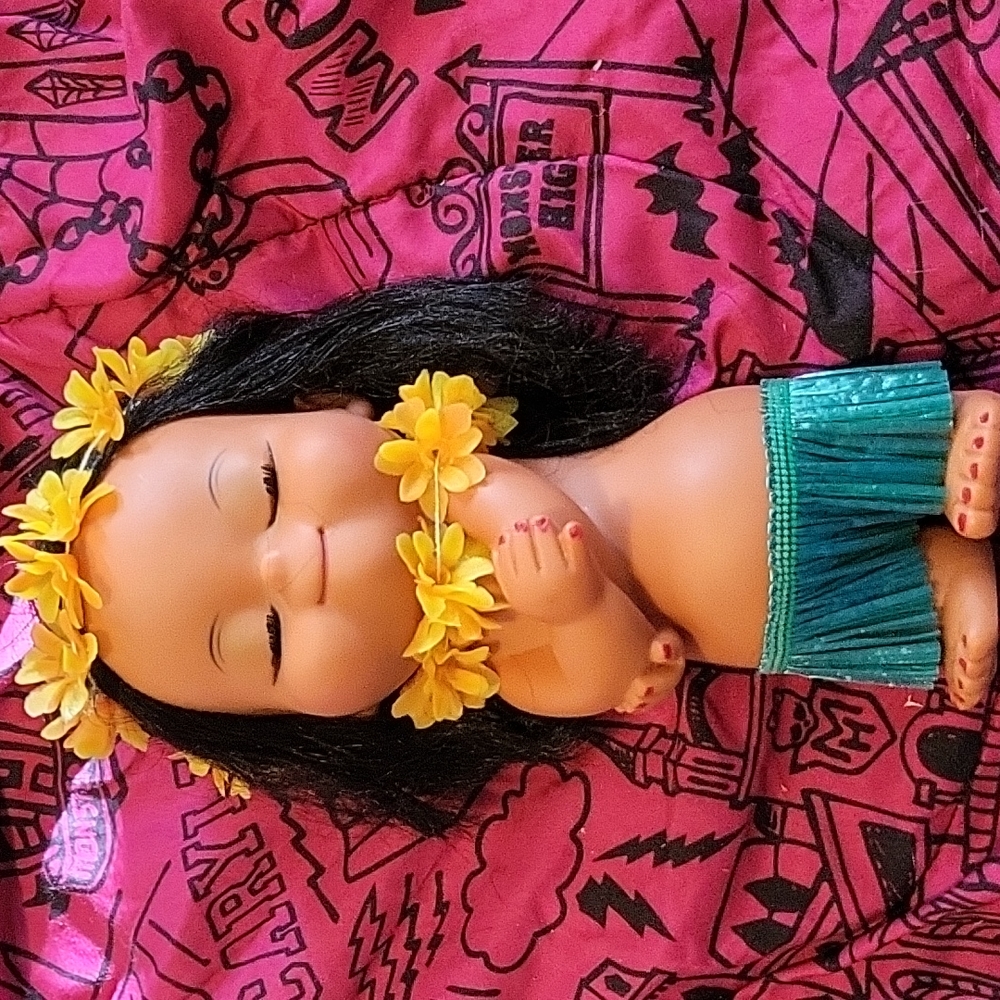 Vintage Souvenir Doll with Yellow Flowers and Green Skirt